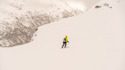Ordino Acalis,skier dressed in yellow enjoying a white sports day 2024