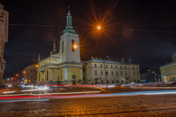 Night Lviv old city architecture in the winter season. Buildings highlighted by the illumination