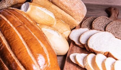 Bread for breakfast, wooden background
