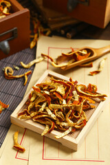 tangerine peel  on a bamboo plate