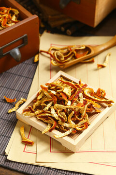 tangerine peel  on a bamboo plate