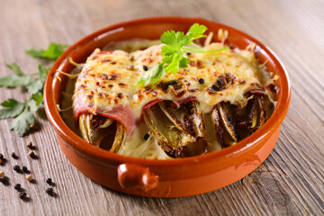 baked chicory with ham and cheese