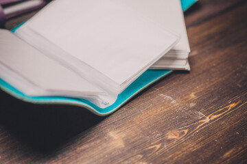 different color business card holders credit card storage accessories wooden table