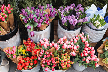Bouquets of flowers, tulips, lavender in a flower shop.