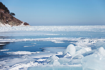 Ice floes near Listvyanka village. Baikal lake winter landscape