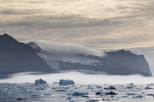 Sea ice and icebergs calved from the Christian IV Glacier, Nansen Fjord, eastern Greenland, Polar Regions