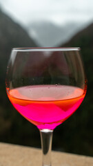 glass with new post covid drink with strong fluor color