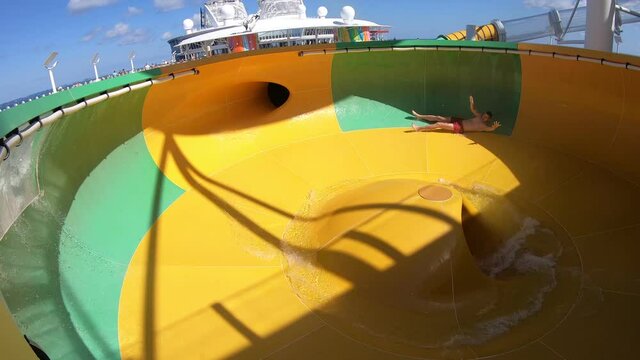 Man Having Fun On A Cruise Ship Bowl Water Slide