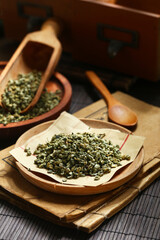 lotus leaf tea in wooden tray