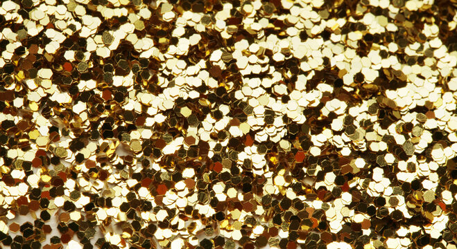 Gold (bronze) glitter shine dots confetti. Abstract light blink sparkle horizontal backgound.