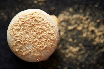 Macaroons in powder on marble