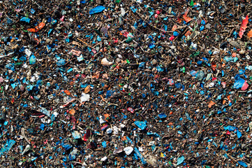scraped paint, scraps on the floor of the shipyard