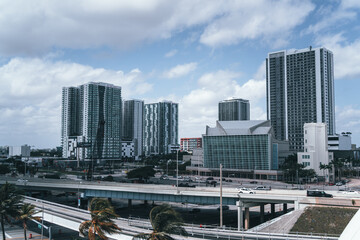 Fototapeta premium city bridge road construction buildings homes apartments sky clouds miami florida 