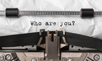 Text Who are you typed on retro typewriter