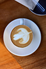 Coffee Cappuccino Art In Mug With A Relaxing Time.