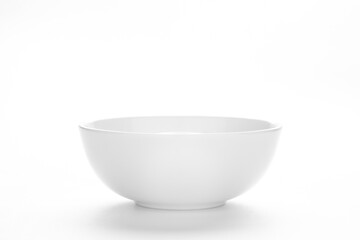 An empty white ceramic white bowl for mockup. Top lighting.