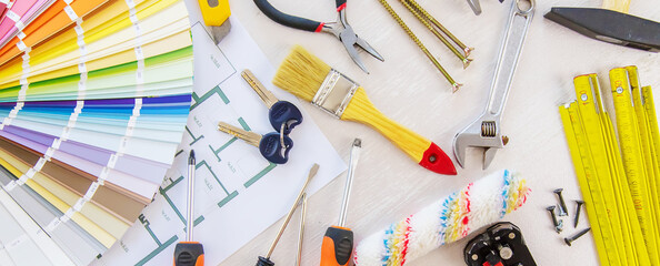 home improvement and renovation concept - construction tools and items. selective focus.