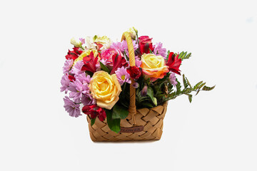 Fototapeta na wymiar Bouquet of flowers in a basket on a white background