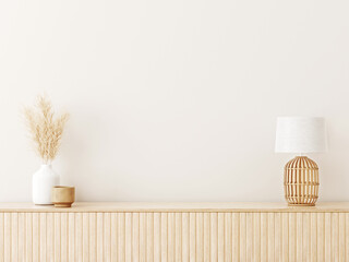 Interior wall mockup in minimalist Japandi style with light biege wooden console, dried pampas grass and wicker basket lamp on empty warm white background. Close up view, 3d rendering, 3d illustration