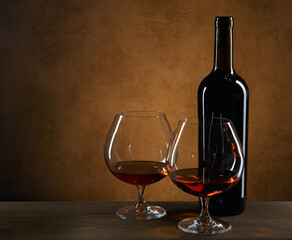  Two glass of Cognac Or Brandy and bottle