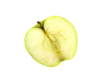 A green apple with a shadow on a white background is isolated