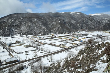 Snow, ice and adverse weather conditions bring things to a stand still in the housin .View of the...