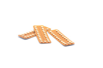 Pills in plates on a white background