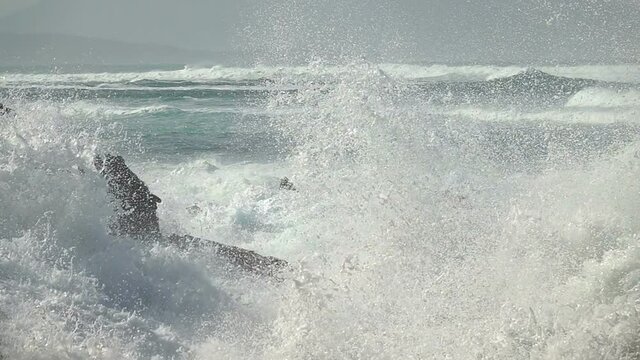 Extreme Ocean, Waves crushing coast. Power of waves breaking splashing, sea-spray water foam