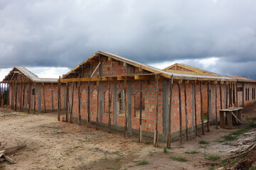 Fototapeta na wymiar Construction of a religious monastery of the Order of Saint Benedict on a cloudy day, in Parana State, Brazil., in Parana State, Brazil.
