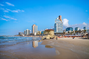 Tel Aviv beach with a view of Mediterranean sea and sea front hotels, Israel.