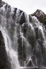 Fototapeta na wymiar waterfall in the mountains Clashnessie Falls nc500 north coast 500 scotland