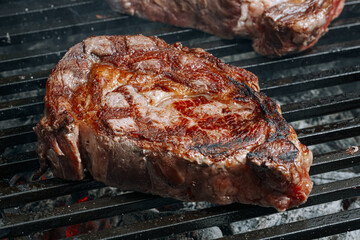 barbeque steak on a black slate board