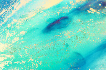 art photography of abstract fluid art painting with alcohol ink, blue and gold colors