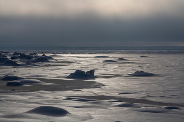 Fototapeta na wymiar ice on the sea sunlight on the front