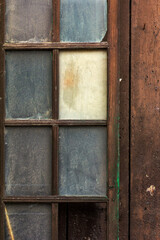 Old door made of different colored glass