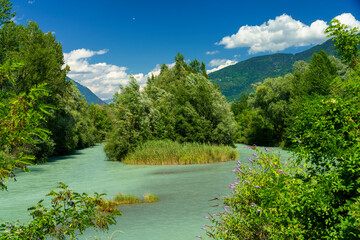 The Adda river along the Sentiero della Valtellina at summer - obrazy, fototapety, plakaty