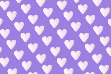 Pastel purple background with white hearts pattern. Minimal love art design.