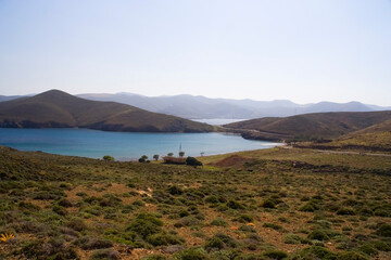 Landscape of Astypalea island, Greece. At the background there can be seen the narrowest part of the island, a corridor of a few dozens meters that connects the eastern and western part of the island.