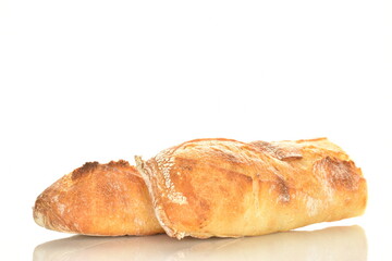 Two delicious freshly baked French baguette halves, close-up, isolated on white.