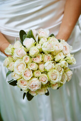 bride holding bouquet of flowers