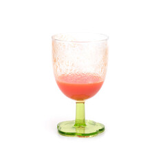 Tomato juice in a glass isolated on a white background