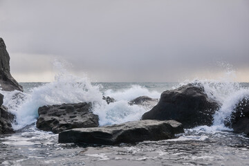 cold winter sea behind coastal cliffs