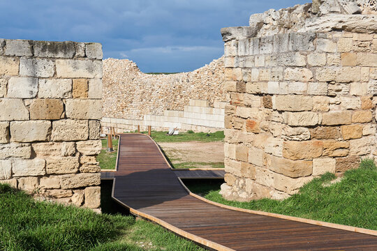 walkways for tourists among the ruins of the walls of the ancient fortress in Chersonesos