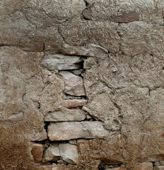 Loam wall at Acoma Pueblo. Sky City. New Mexico USA. Indian village. Indian culture. Pictures from 1984. Cracks in the wall.