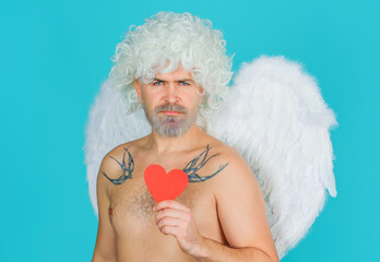 Valentines day. Cupid with red heart. Angel with wings. Amour. February 14.