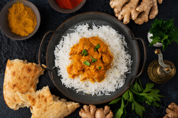 Chicken curry with rice and spices - a traditional popular Indian dish