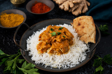 Chicken curry with rice and spices - a traditional popular Indian dish