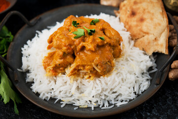 Chicken curry with rice and spices - a traditional popular Indian dish