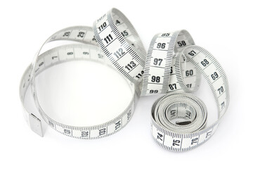 Measuring tape cut out and isolated on white background