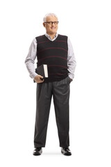 Full length portrait of a male professor holding a book and smiling